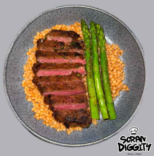 Cajun steak giant couscous asparagus